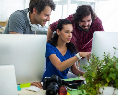 Professionals discussion on enhancing user experience of a website